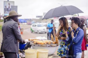 Sosu Patrick Attending to a customer (photo by (Kobby Blay)