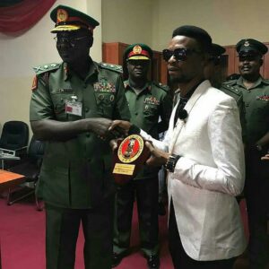 Nigerian Comedian, I Go Dye gets honoured by the Nigerian Army