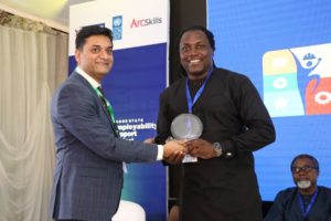 Amit Washington, CEO, Arc Skills Nigeria presenting a plaque to one of the entertainment sector panelists, Steve Babaeko, CEO, X3M Ideas at the Lagos State Employability Support Project Entertainment Sector Industry Engagement held at The Civic Centre, Victoria Island, Lagos on Friday.