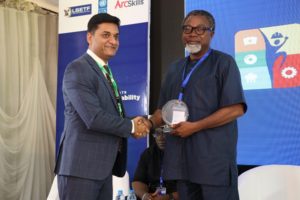 Amit Washington, CEO, Arc Skills Nigeria presenting a plaque to one of the entertainment sector panelists, Mahmood Ali-Balogun, CEO, Brickwall Communications Ltd at the Lagos State Employability Support Project Entertainment Sector Industry Engagement 