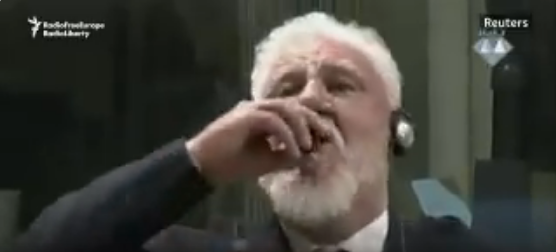 War Criminal dies after Drinking Poison in UN Courtroom in Protest of his Sentence being Upheld