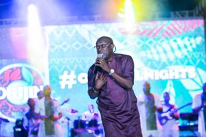 Adewale Ayuba performing on stage