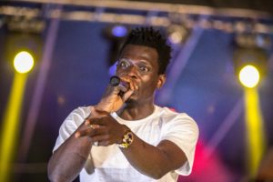 Terry Apala performing