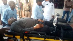 Senator-Dino-Melaye-wheeled-into-the-hospital-on-a-stretcher