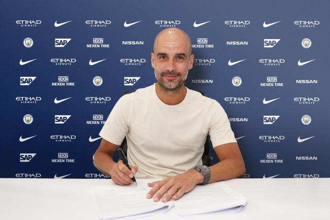 Pep Guardiola extends Man City contract to 2021