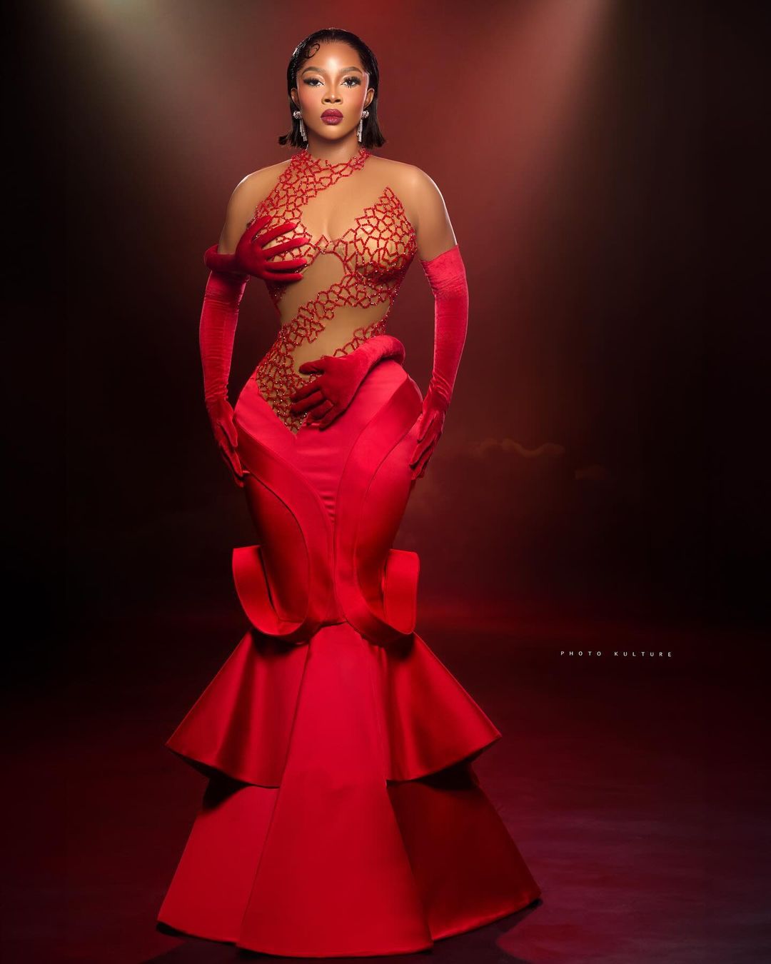 Toke Makinwa In Red Avant-Garde For BBNaija 9 Finale | fab.ng